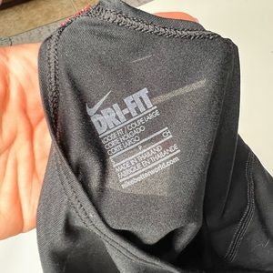 Nike dri-fit Red straps , black top size S